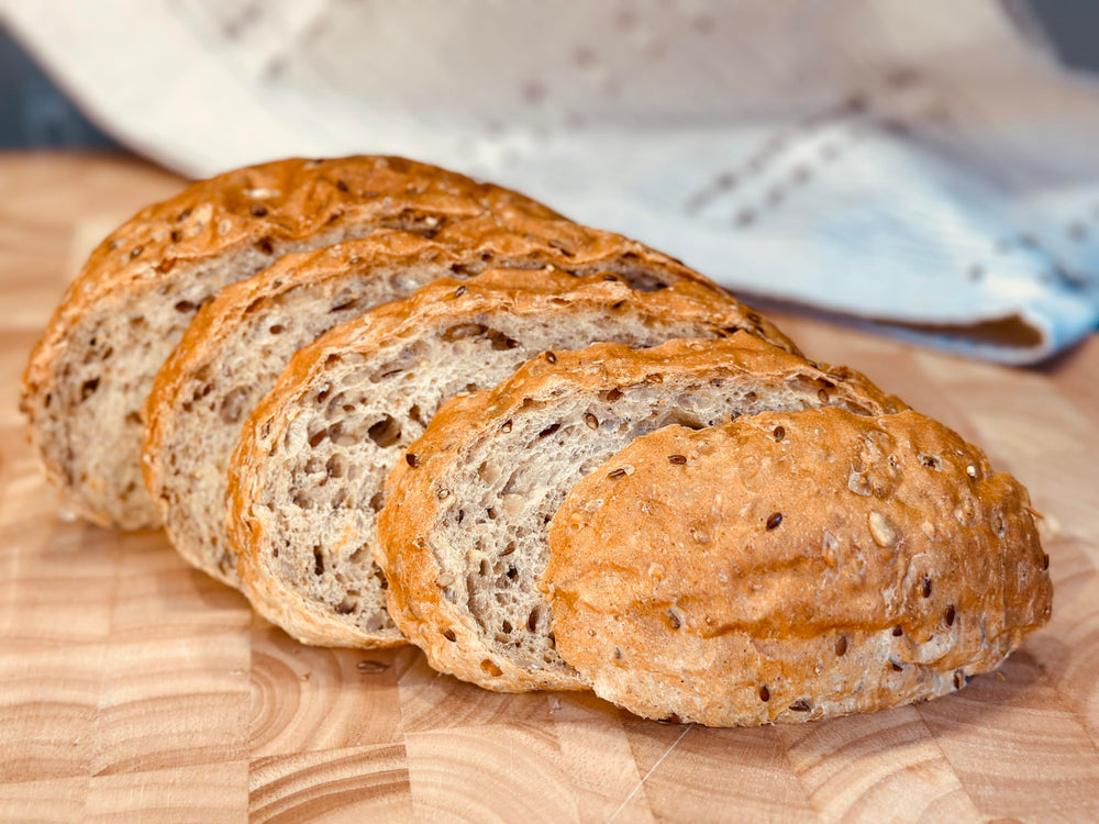 Molibake 8 Grain Bread Mix oven-baked loaf displays golden crust and savory aroma.