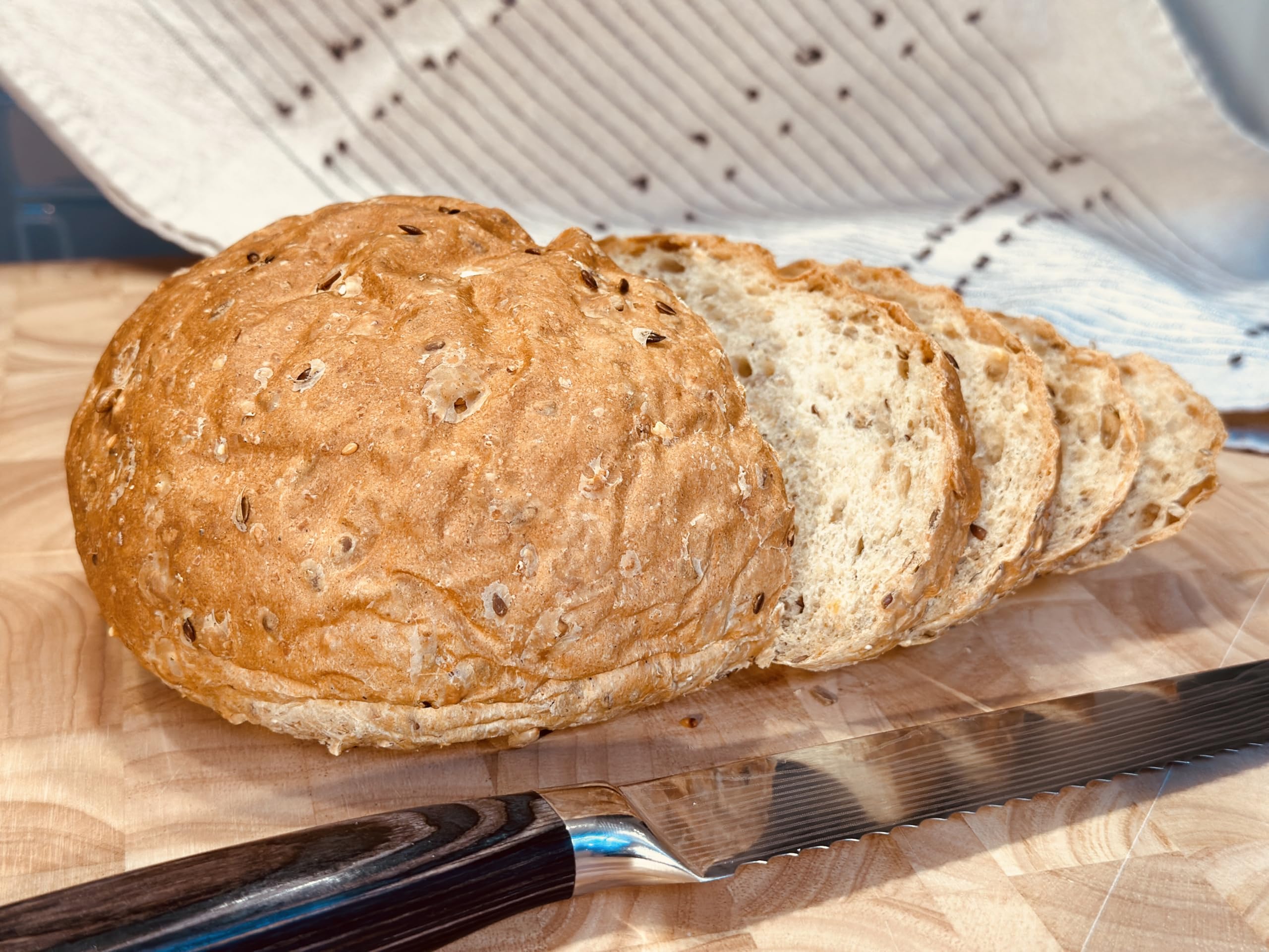 Molibake 8 Grain Bread Mix sliced loaf emphasizes fresh, wholesome slice for sandwiches.