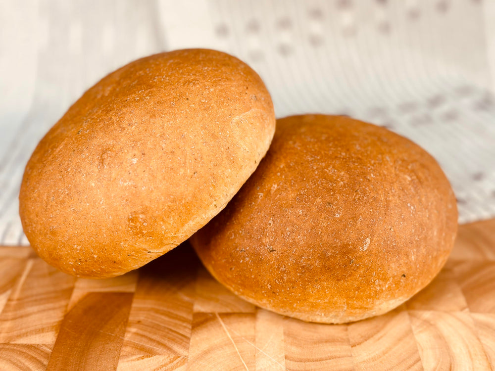 Molibake mix beside a bread machine for easy home baking