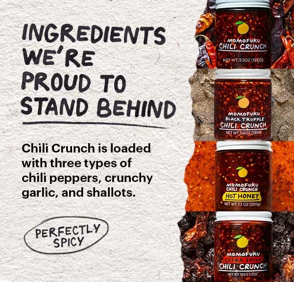 Spoon dipping with Momofuku Black Truffle Chili Crunch for dipping