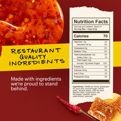 Momofuku Hot Honey Chili Crunch jar close-up demonstrates drizzle-ready texture for pizzas and meats