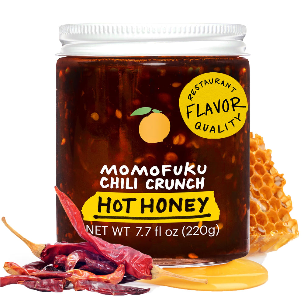 Momofuku Hot Honey Chili Crunch jar close-up showing glossy chili honey for bold flavor