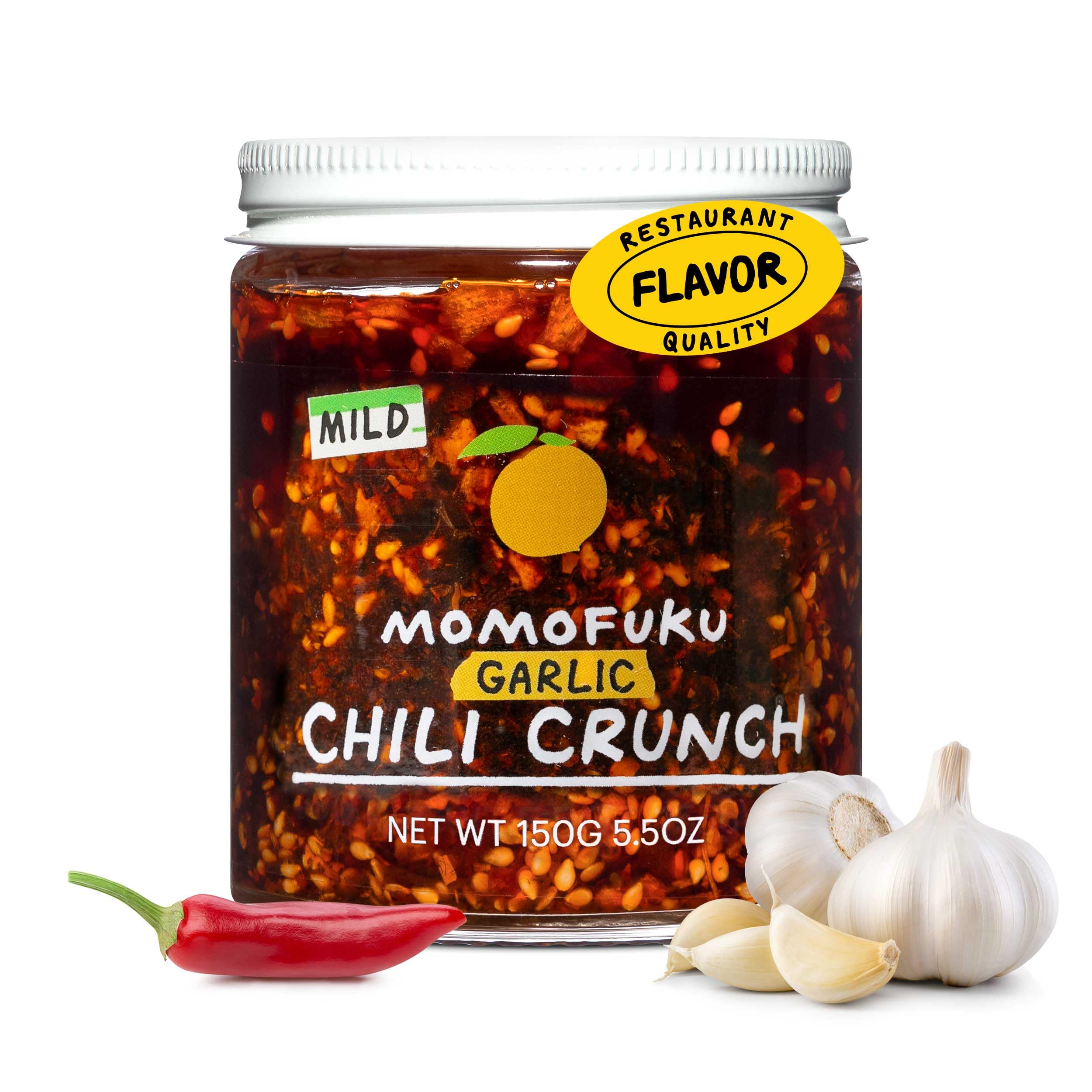 Momofuku Mild Garlic Chili Crunch bottle front, versatile flavor boost for bowls and toast.