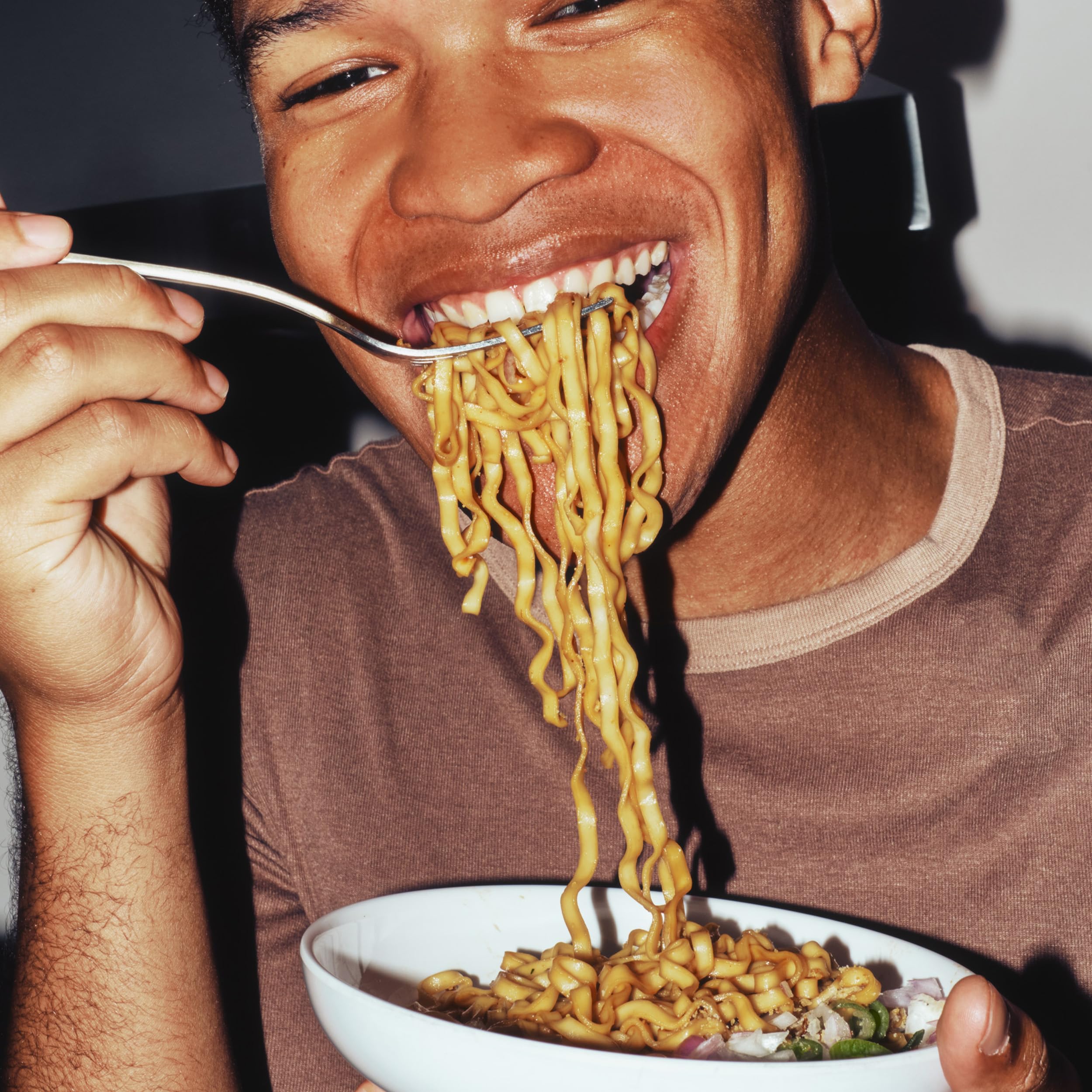 Serving setup with bowl and chopsticks featuring Momofuku ramen