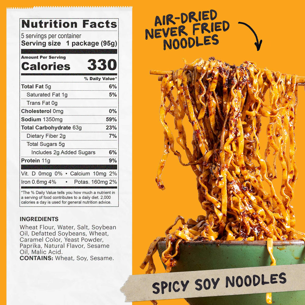 Close-up of Momofuku Spicy Soy Ramen bowl showing bold sauce and chili heat.