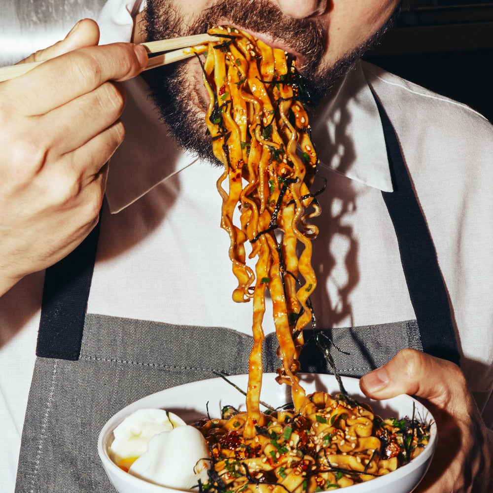 Ready-to-serve Momofuku Tingly Chili Noodles for convenient meals.