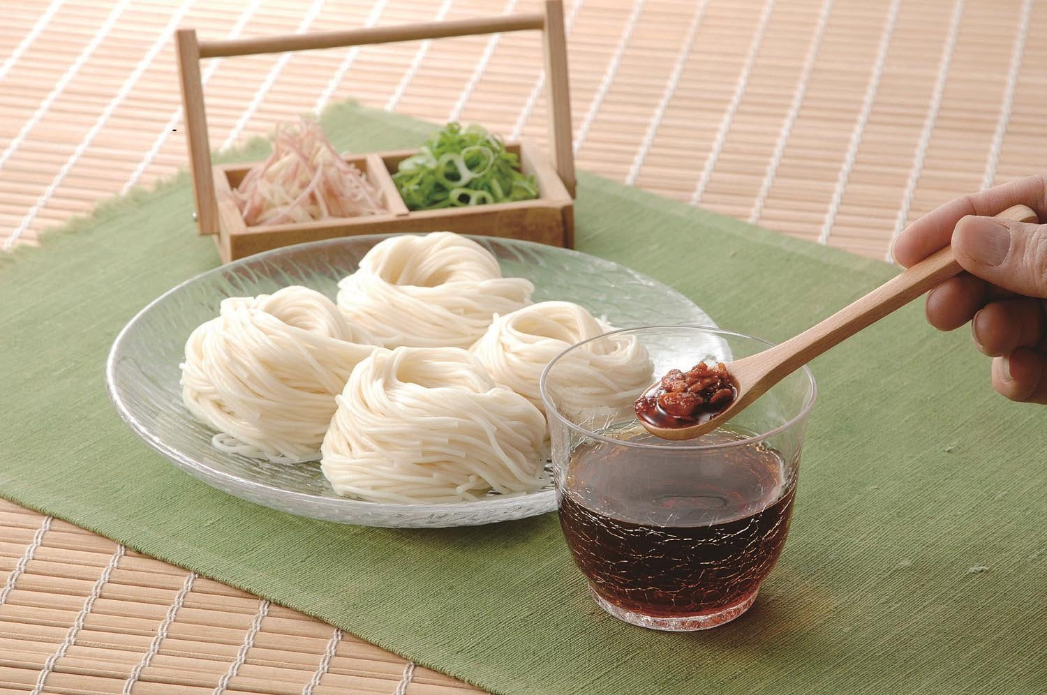 Momoya chili oil on a vibrant plate adds subtle heat.
