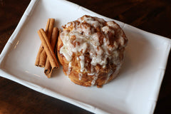 Mom's Place Gluten-Free Cinnamon Swirl Bun batter rising in oven for baking.