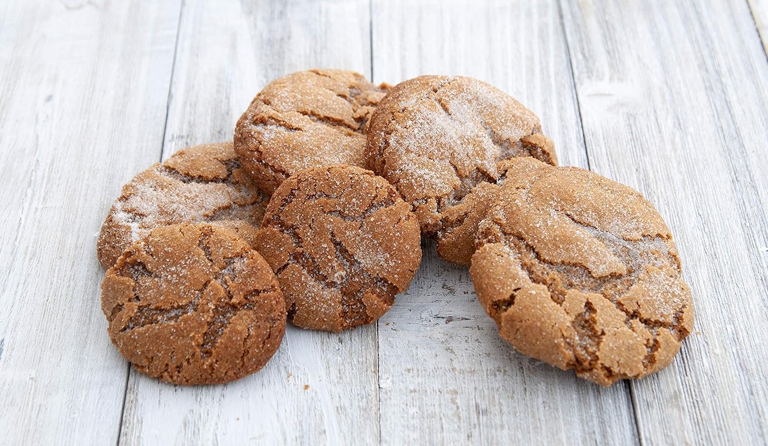 Mom's Place Gluten-Free Molasses Cookie Mix baking on sheet, warm spice aroma with dairy-free results.