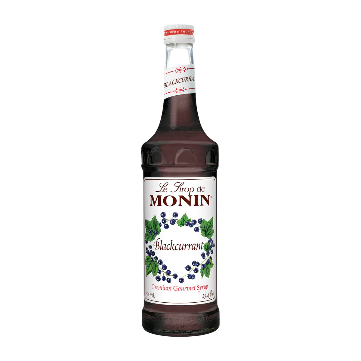 Monin Blackcurrant Syrup bottle on a bar enhances beverages.