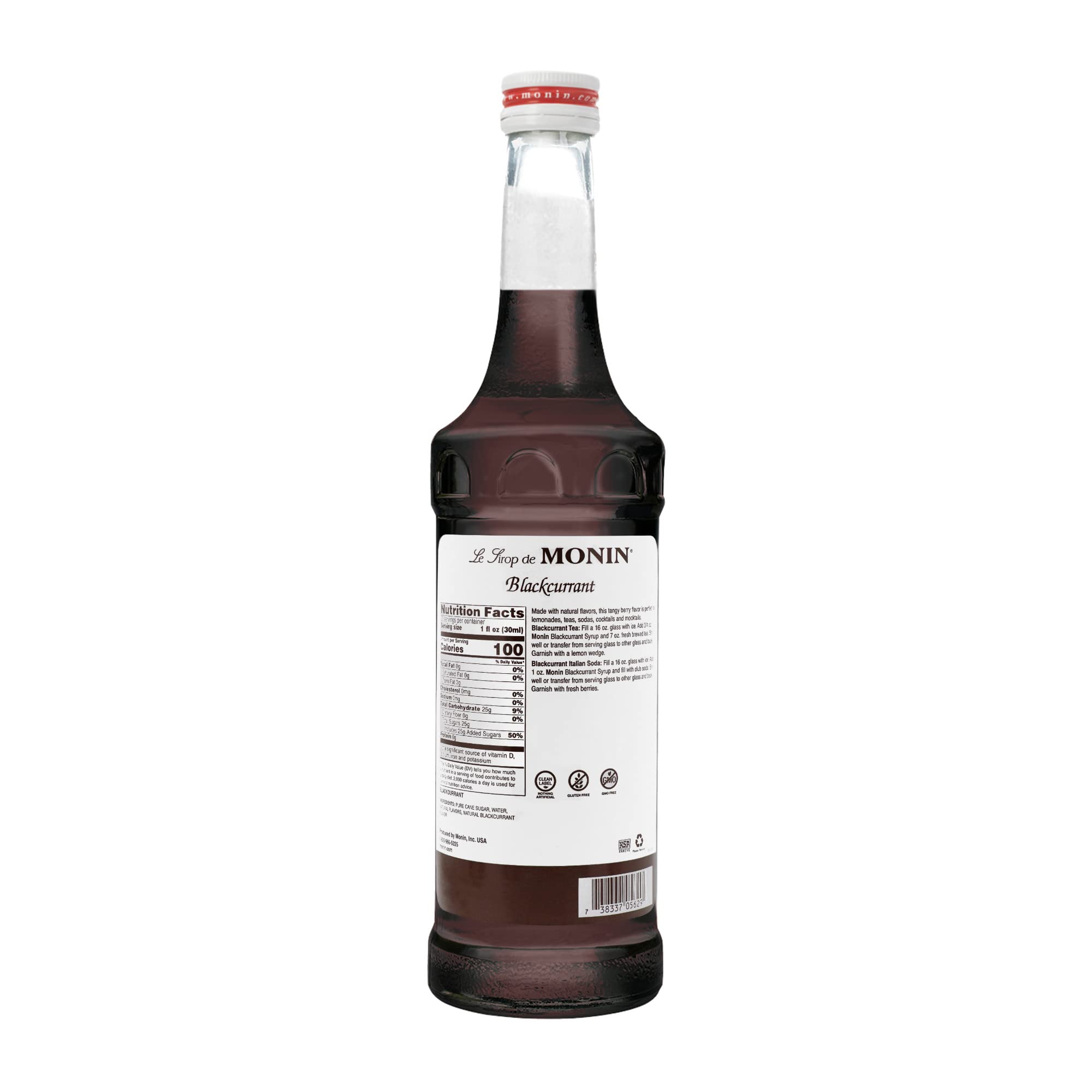 A glass with Monin Blackcurrant Syrup creating a rich, fruity drink.