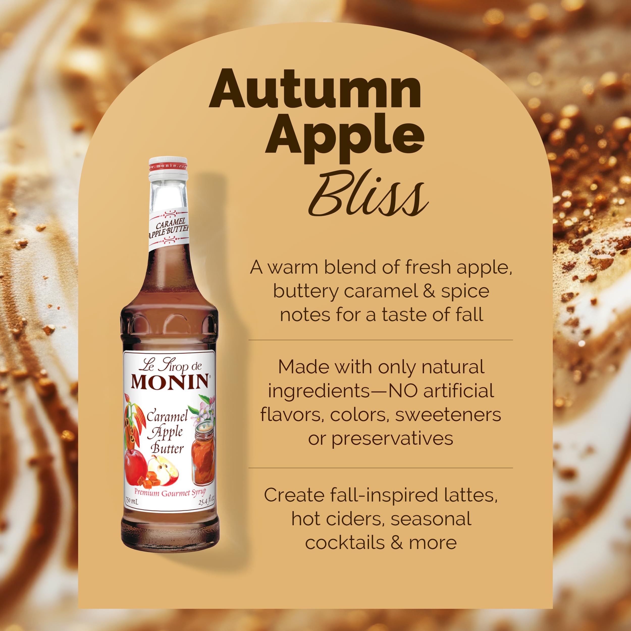 Monin Caramel Apple Butter Syrup bottle beside a cinnamon-spiced cider.