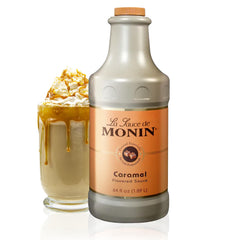 Monin Caramel Sauce bottle pouring to enrich coffee and desserts for a rich flavor finish.