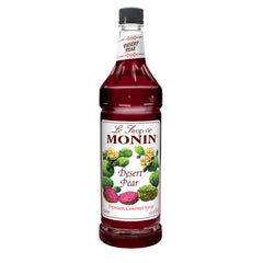 Monin Desert Pear Syrup bottle with bright color for drinks