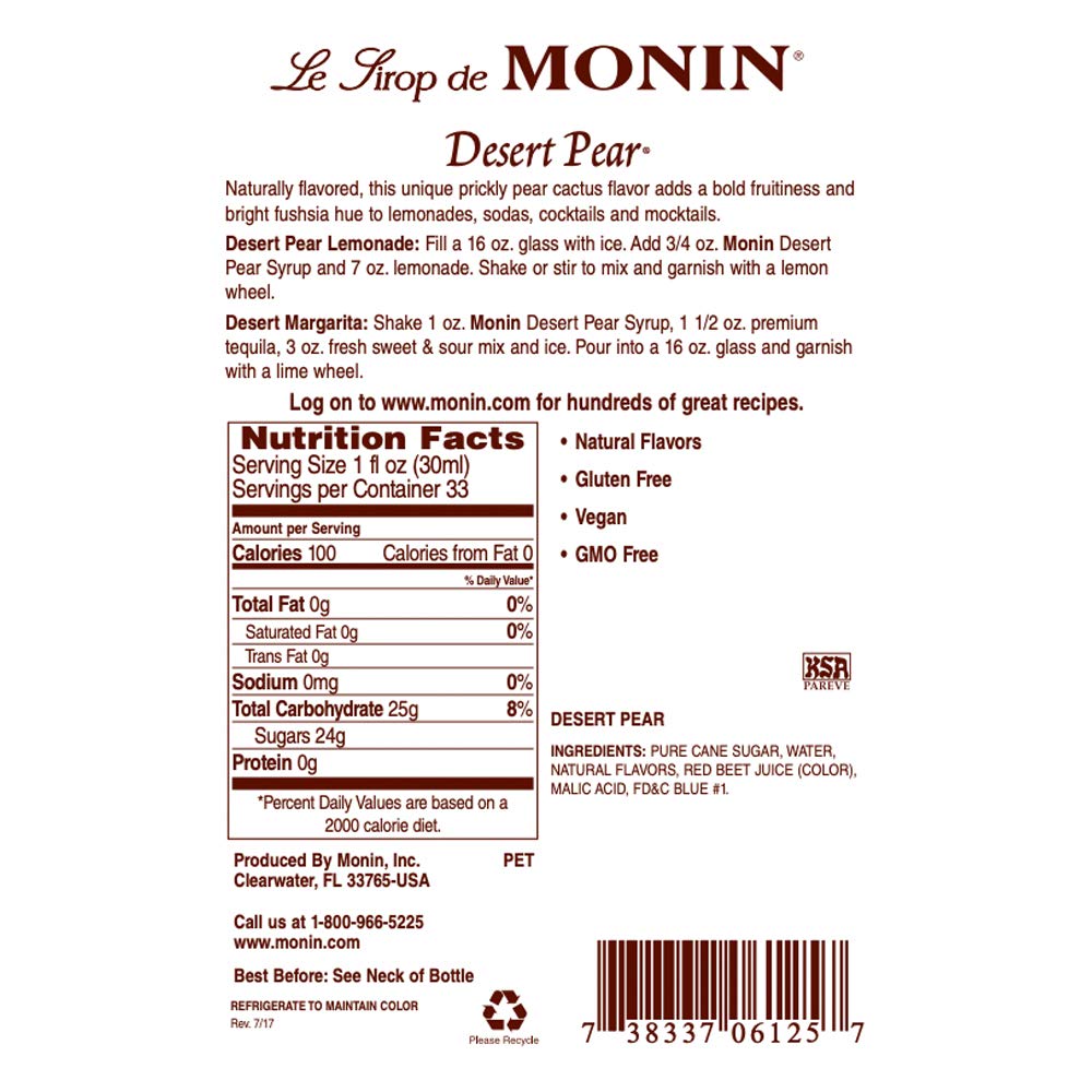 Pouring Monin Desert Pear Syrup into a glass for refreshing drinks