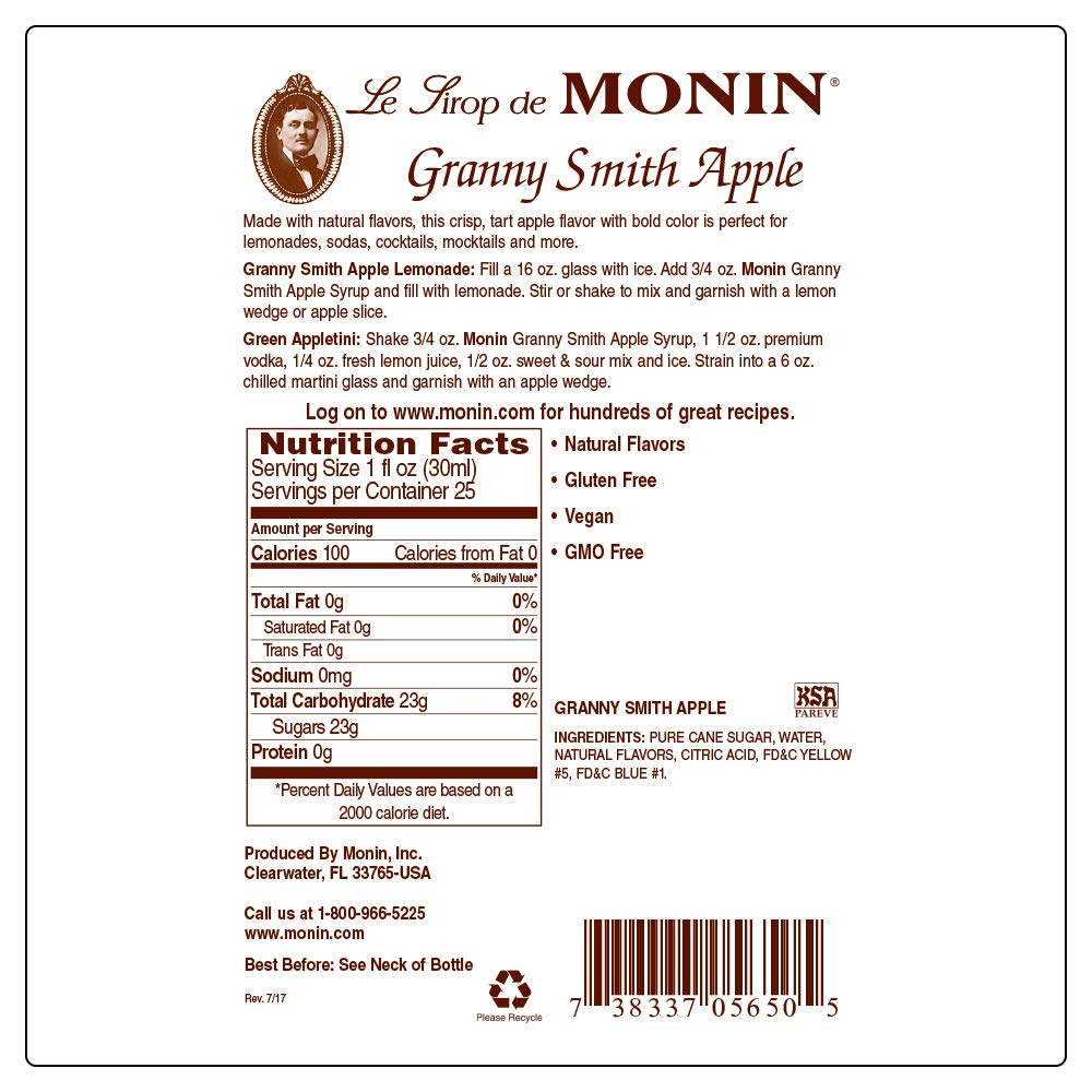 Monin Granny Smith Apple Syrup cocktail glass highlights crisp apple flavor.