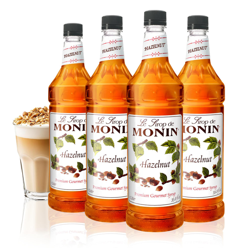 Monin Hazelnut Syrup bottle on shelf, ideal for mochas and lattes