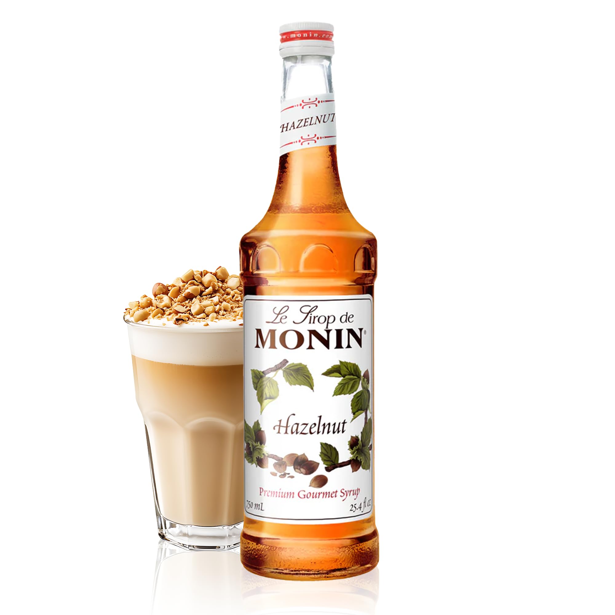 Monin Hazelnut Syrup bottle on counter enhances coffees with caramelized hazelnut flavor.