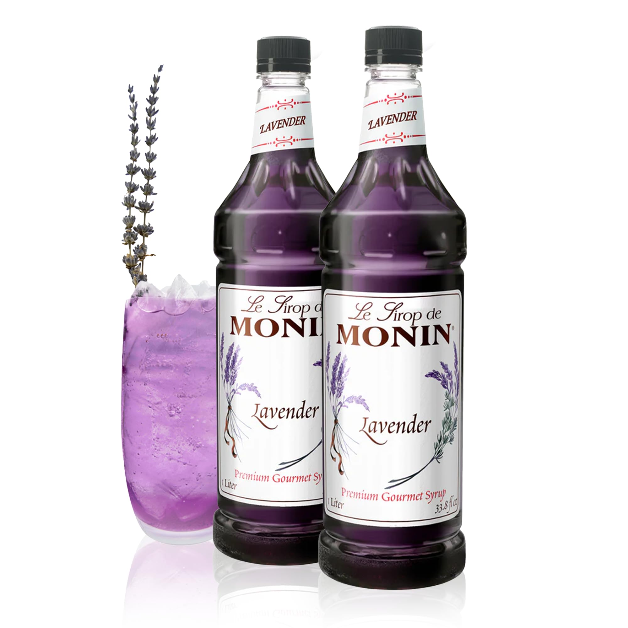 Monin Lavender Syrup bottle pouring, ideal for fragrant cocktails.