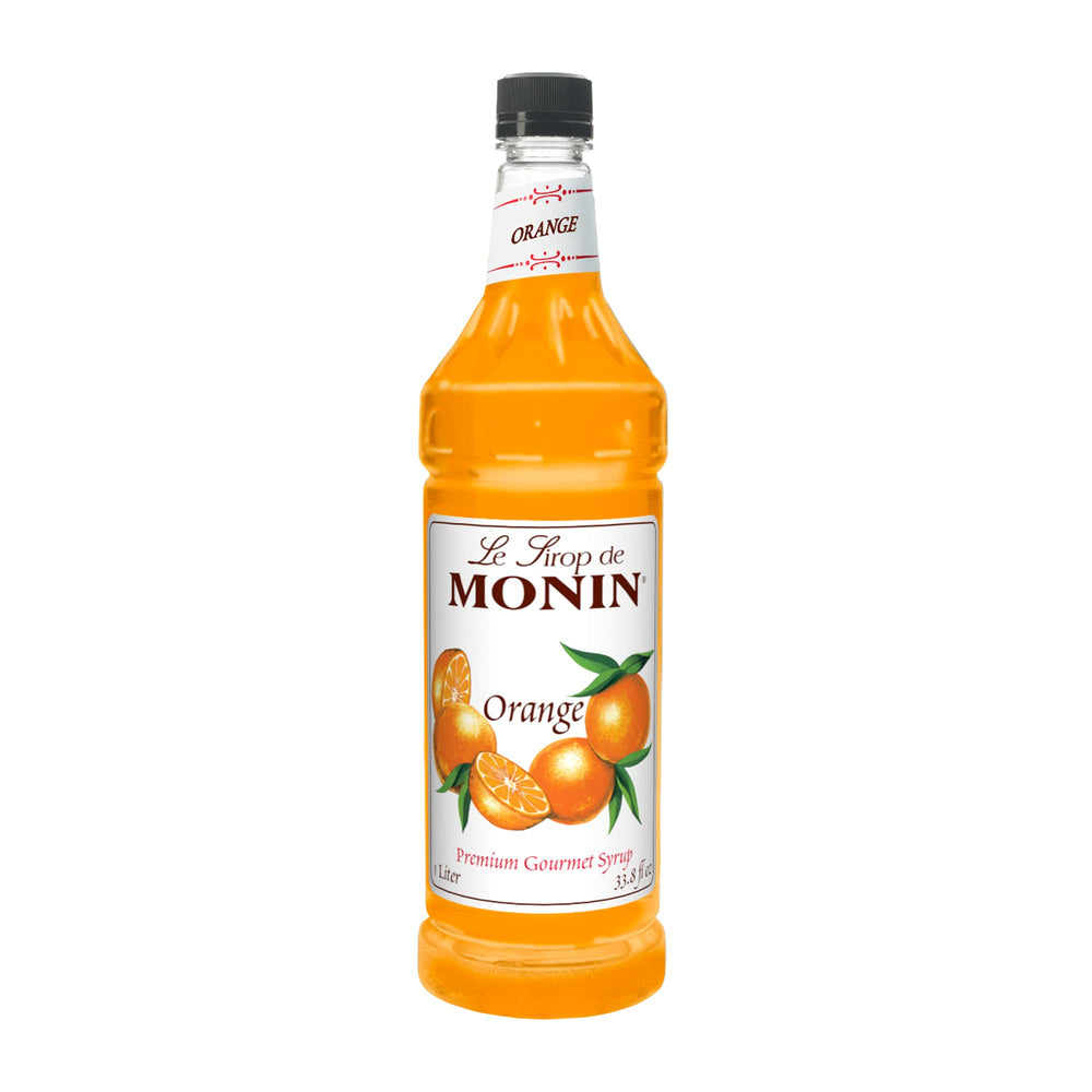 Monin Orange Syrup bottle pour for cocktails and desserts.