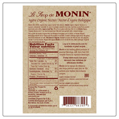 Close-up of Monin Organic Agave Nectar bottle highlighting notes.