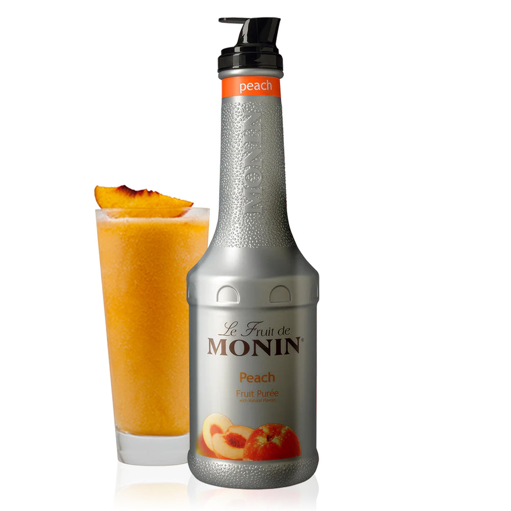 Monin Peach Fruit Purée bottle highlighting real fruit flavor, ideal for cocktails and lemonades.
