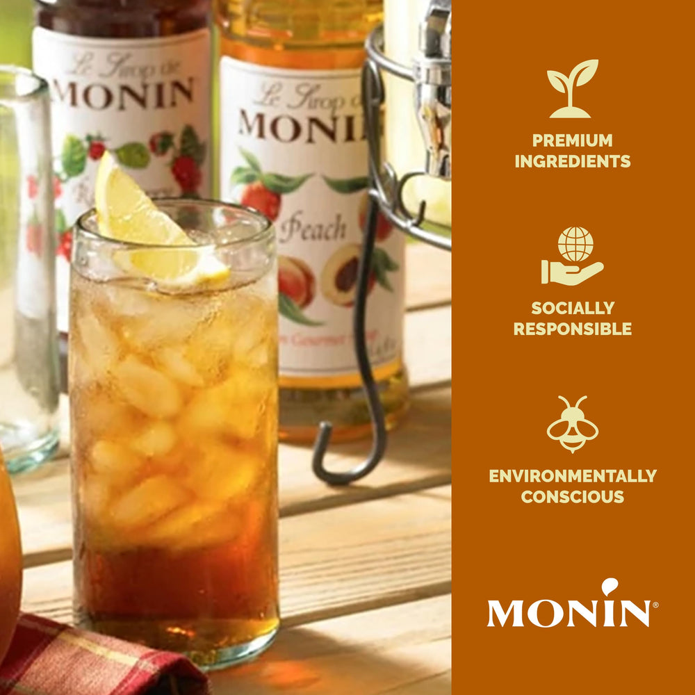 Lemonade glass sweetened with Monin Peach Syrup for a zesty fruit-forward twist.