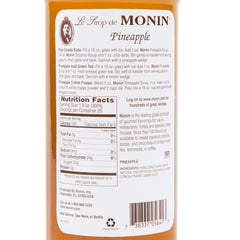 Monin Pineapple Syrup used in a cocktail or mocktail setting