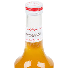 Monin Pineapple Syrup label closeup highlighting natural pineapple flavor