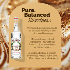 Close-up of Monin Pure Cane Syrup dispensing pour spout in use