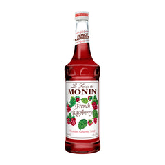 Monin French Raspberry Syrup bottle reveals bright berry aroma, great for lattes and cocktails.
