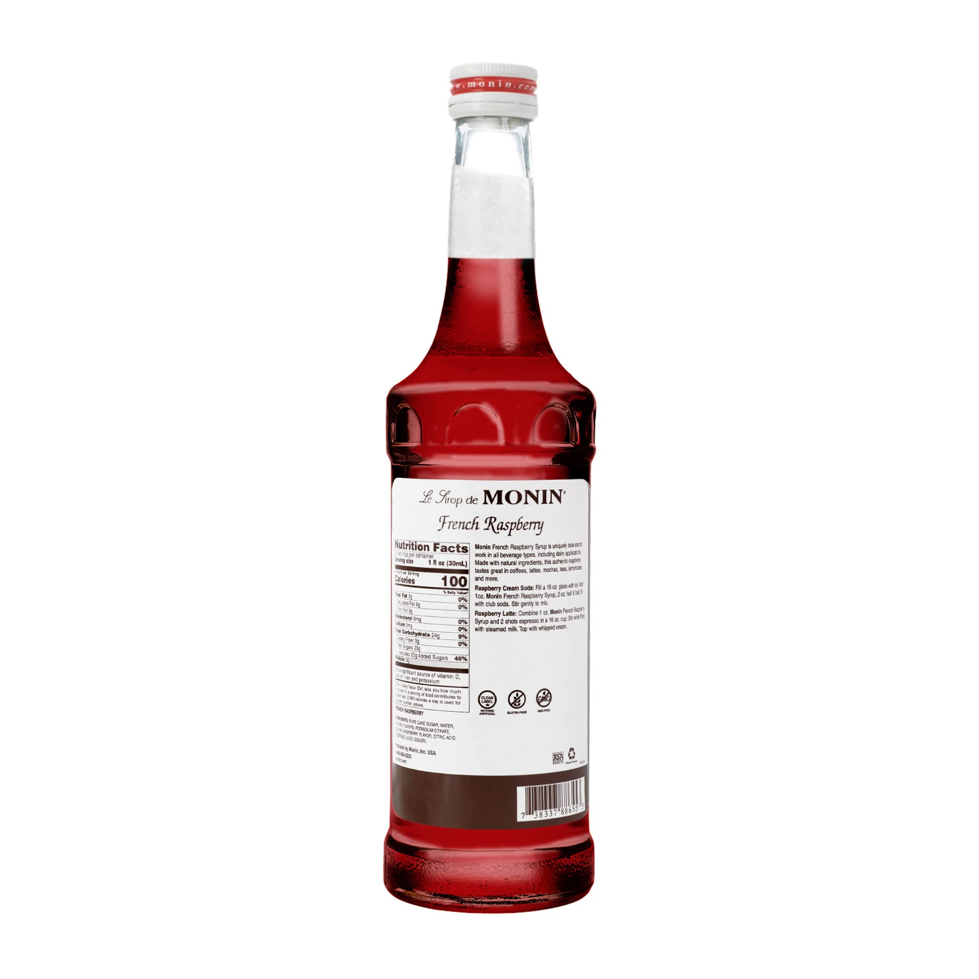 Monin Raspberry Syrup pour streams into a glass, great for espresso drinks and mocktails.