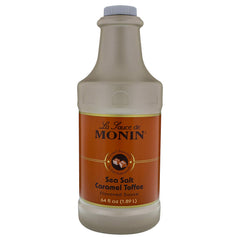 Monin Sea Salt Caramel Toffee bottle; rich, creamy caramel flavor for coffee and desserts.