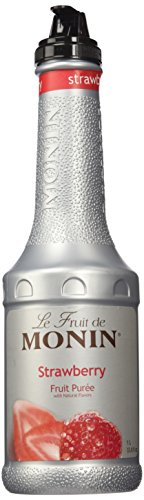 Monin Strawberry Puree dessert topping drizzled over dessert to show versatility
