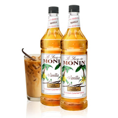 Monin Vanilla Syrup bottle closeup showing Madagascar vanilla aroma for premium drinks.