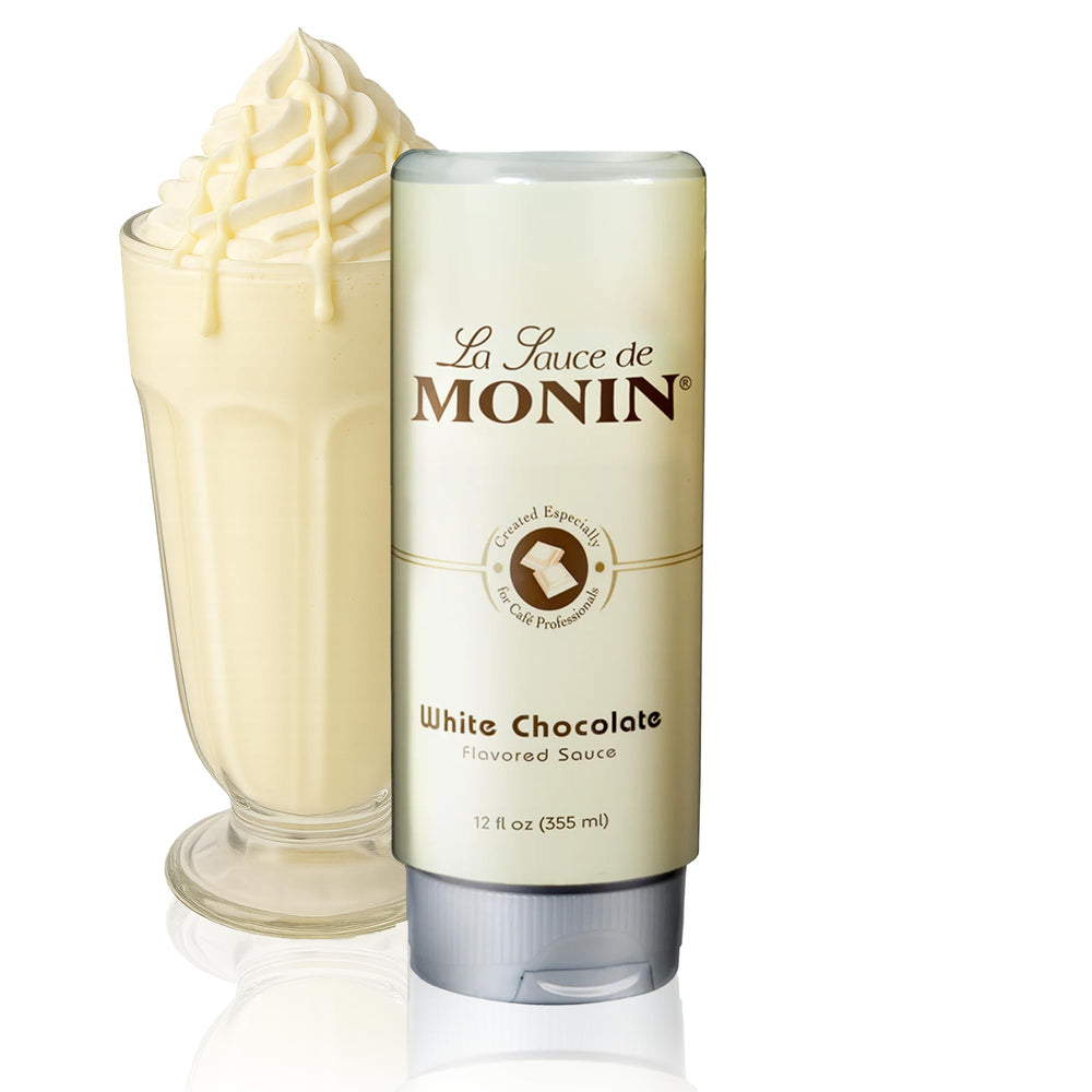Monin White Chocolate Sauce creamy pour highlights rich texture for desserts.