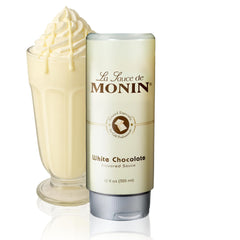 Monin White Chocolate Sauce creamy pour highlights rich texture for desserts.