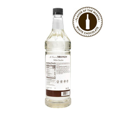 Monin White Chocolate Syrup being poured, ideal for lattes.