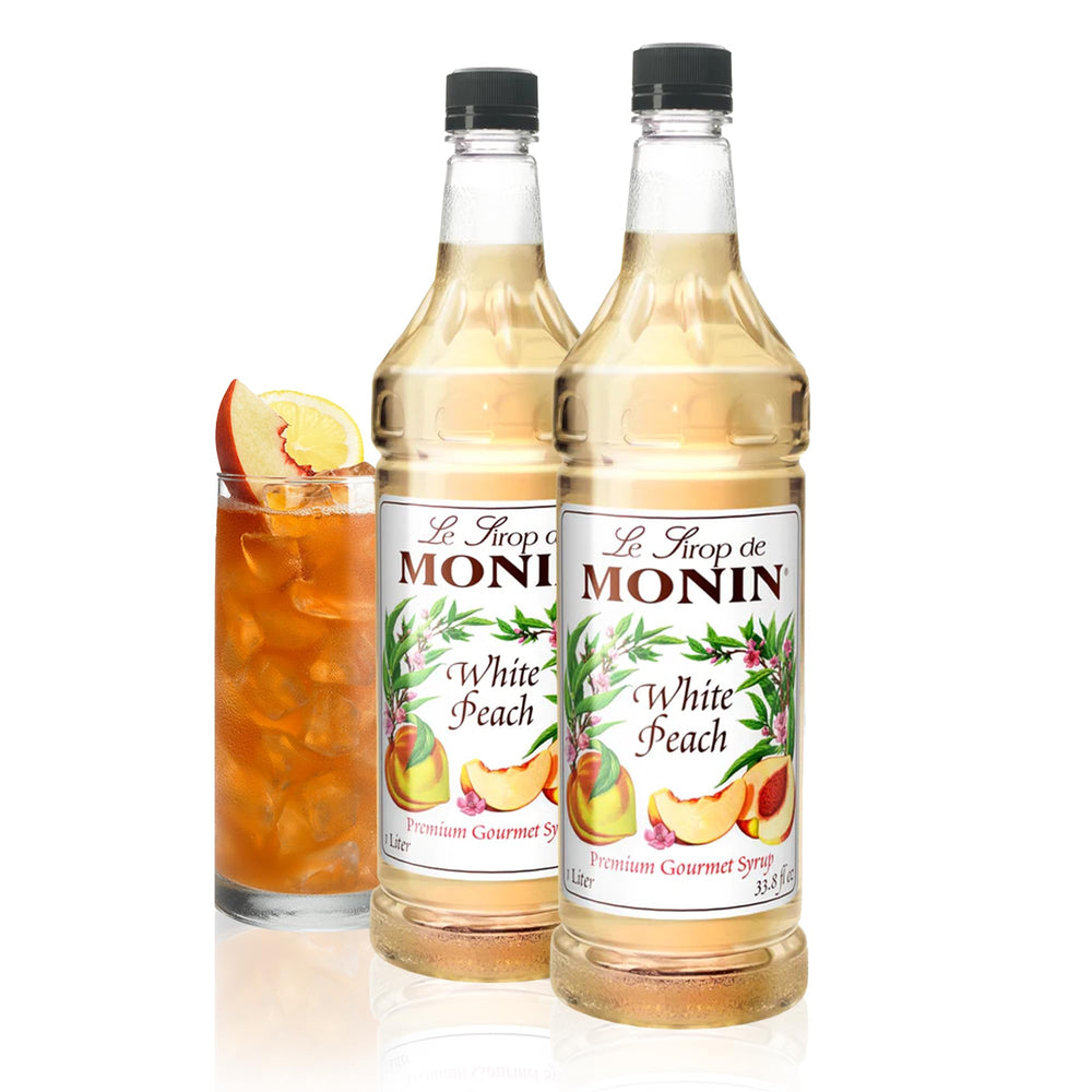 Monin White Peach Syrup bottle for peachy cocktails and iced teas.