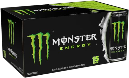 Monster Energy green can poured into a glass for immediate refreshment.