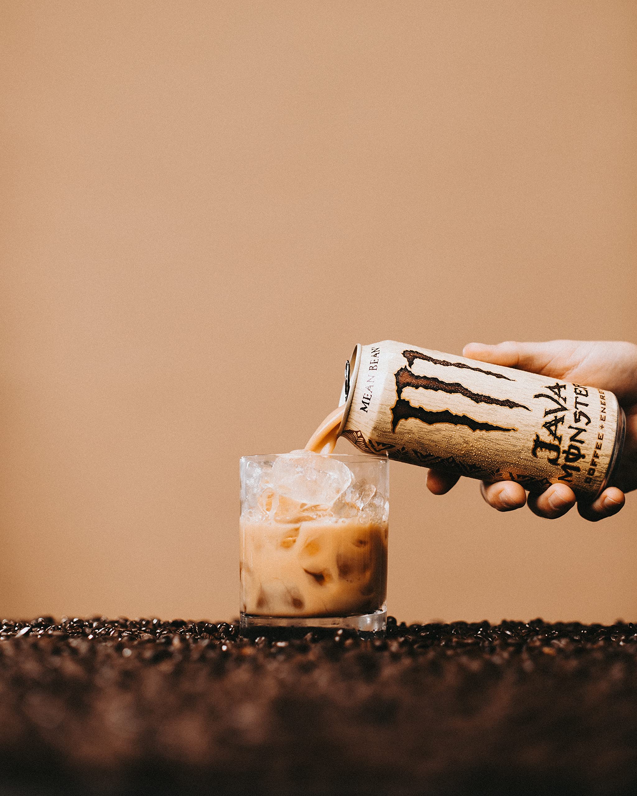 Energy-boosting, non-carbonated Monster Mean Bean in a glass