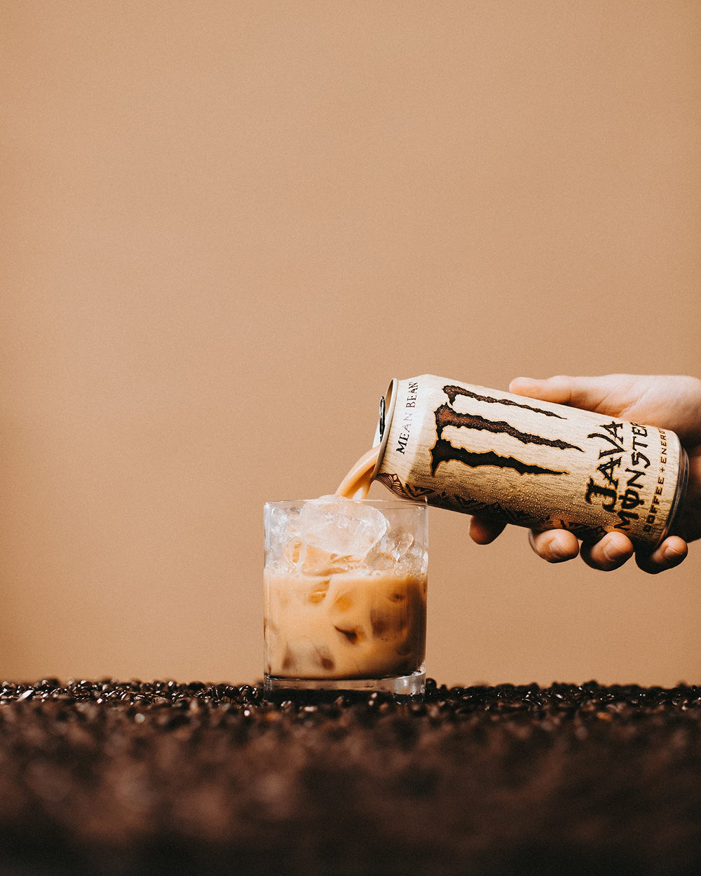 Energy-boosting, non-carbonated Monster Mean Bean in a glass