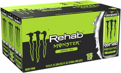 Monster Rehab Green Tea bottle on a desk, ideal for study breaks.