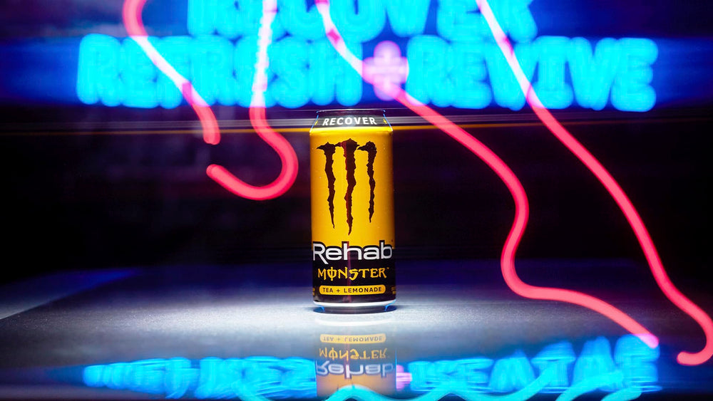 Glass with ice and Monster Rehab Tea Lemonade signals a cool, refreshing pick-me-up.
