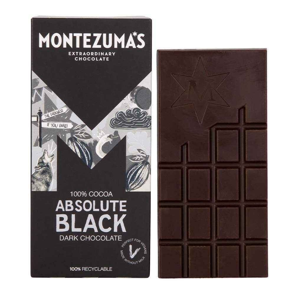 Montezuma Absolute Black 100% Cocoa pack close-up, showcasing pure cocoa intensity for keto snacking.