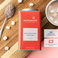 Moonstruck reusable cocoa tin doubles as decor or storage.