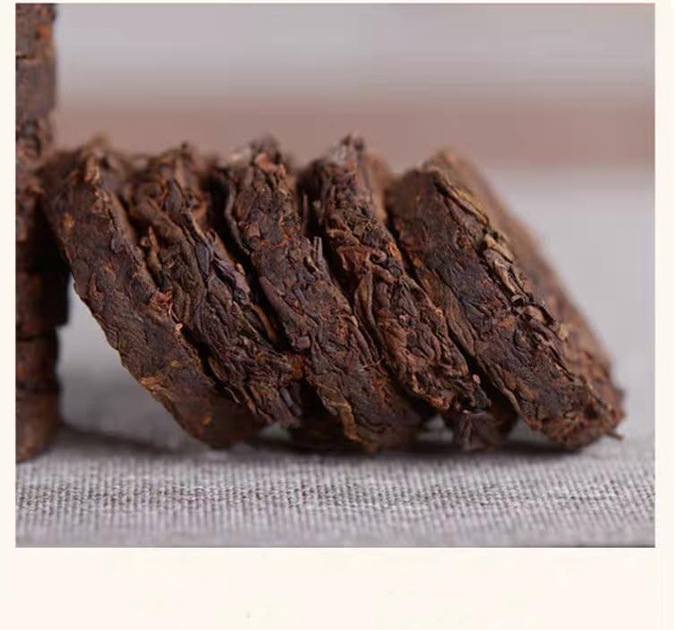 MOORCHOCO Shou Puerh mini cake close-up suggests compact brewing