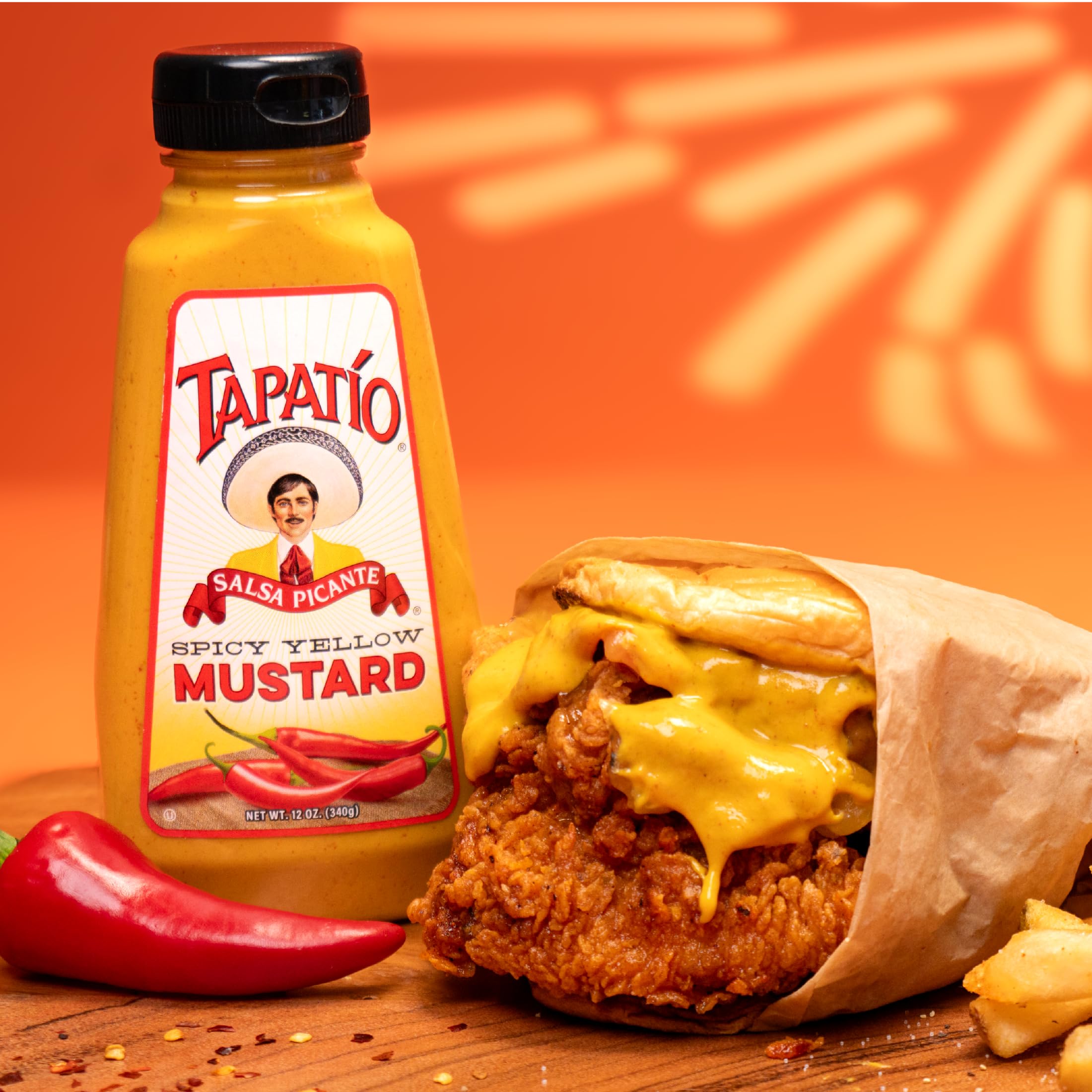 Morehouse Tapatio spicy yellow mustard spread on a sandwich with tangy heat