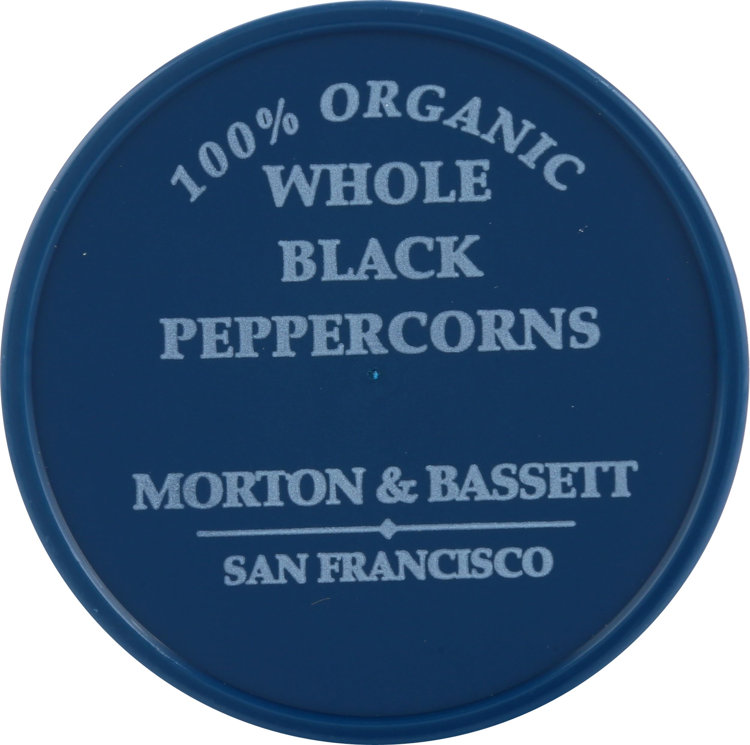 Aromatic Morton & Bassett pepper dusting a dish for enhanced flavor.