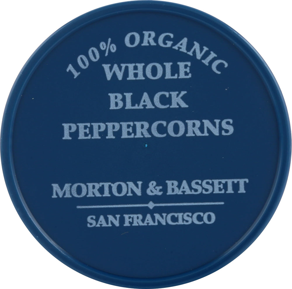 Aromatic Morton & Bassett pepper dusting a dish for enhanced flavor.